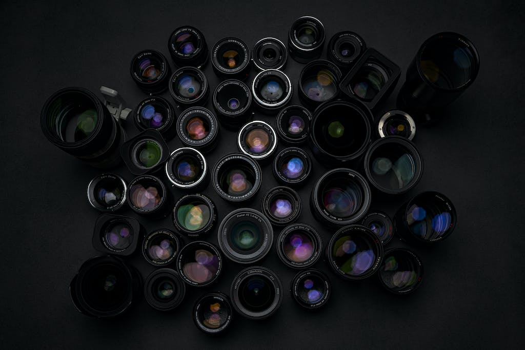 Set of various lenses of photo cameras