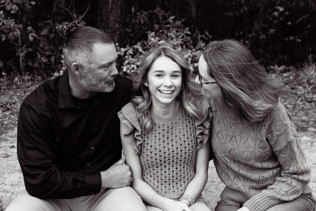 Professional family photographer capturing playful moments